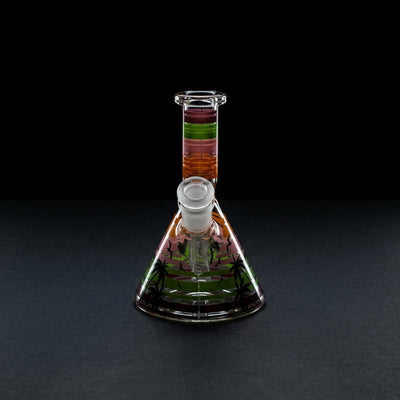 6" Palm Tree Encalmo Decal Beaker on dark slate surface - Oil Slick Pad