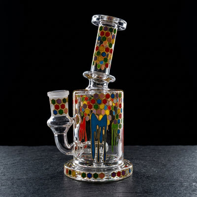 6" Rainbow Bee Decal Rig on dark slate surface - Oil Slick Pad