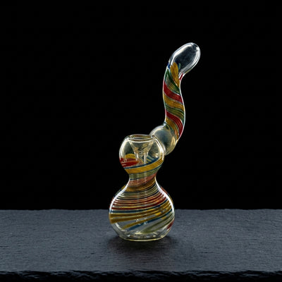 6" Rasta Swirl Bubbler on dark slate surface - Oil Slick Pad