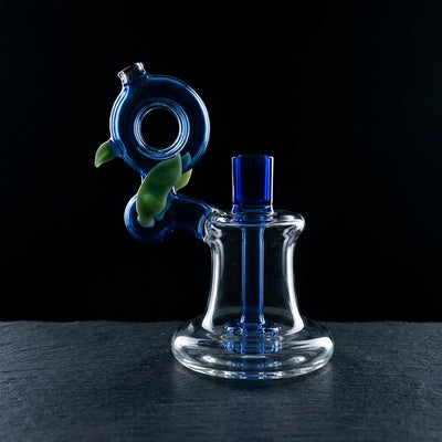 6″ Two-Tone Sculpted Bird Rig on dark slate surface - Oil Slick Pad