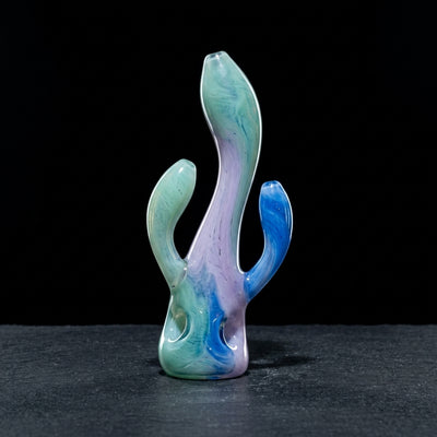 7" Color Dildo Glass Hand Pipe on dark slate surface - Oil Slick Pad
