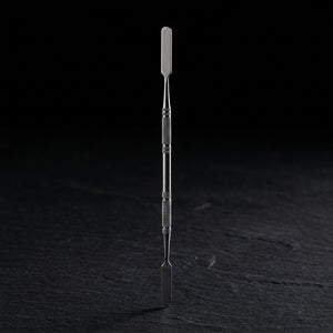 7” Stainless Steel DAB Tool on dark slate surface - Oil Slick Pad
