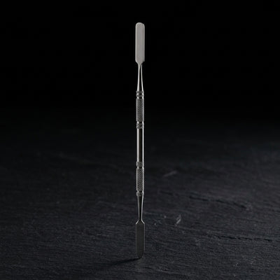 7” Stainless Steel DAB Tool on dark slate surface - Oil Slick Pad