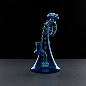 7″ Tentacle Rig W/ Matching Carb Cap on dark slate surface - Oil Slick Pad