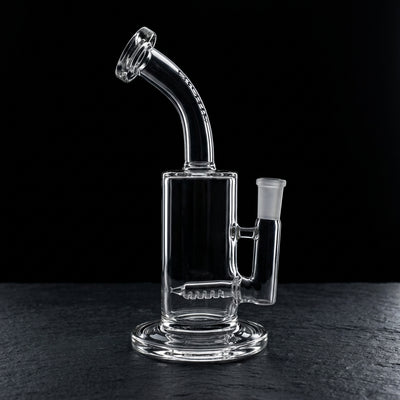 8.5" Encore Clear Inline Rig on dark slate surface - Oil Slick Pad