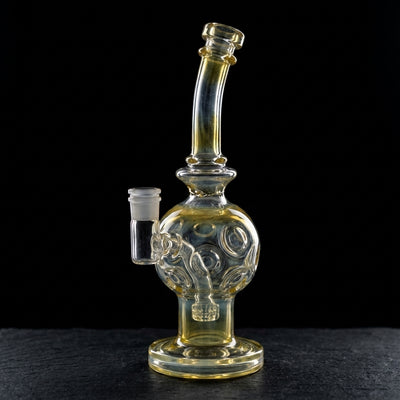 8.5″ Fume Exo Egg Rig on dark slate surface - Oil Slick Pad