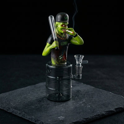 9" Baseball man water pipe on dark slate surface - Oil Slick Pad