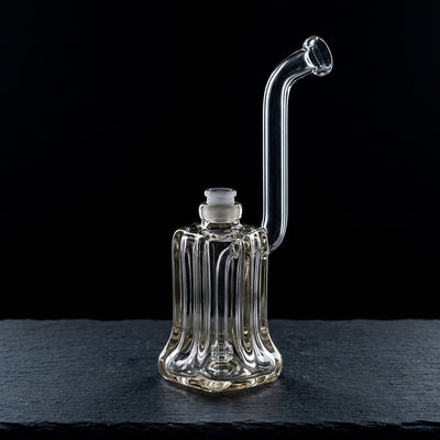 9″ Encore Heavy Hex Bubbler on dark slate surface - Oil Slick Pad