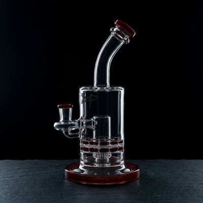 9.5″ Black Sheep Color Accent Ratchet Rig on dark slate surface - Oil Slick Pad