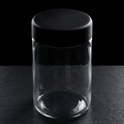 Oil Slick 18oz Child-Resistant Glass Jars with Black Caps - 28 Grams (1 Ounce) Capacity - angle shot
