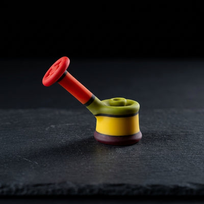Editorial product photography on charcoal slate