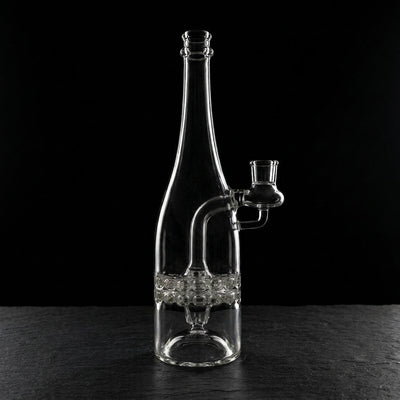 Editorial product photography on charcoal slate