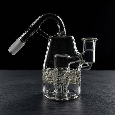 Editorial product photography on charcoal slate