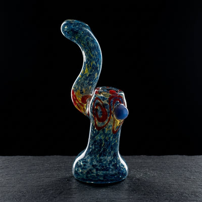 Editorial product photography on charcoal slate