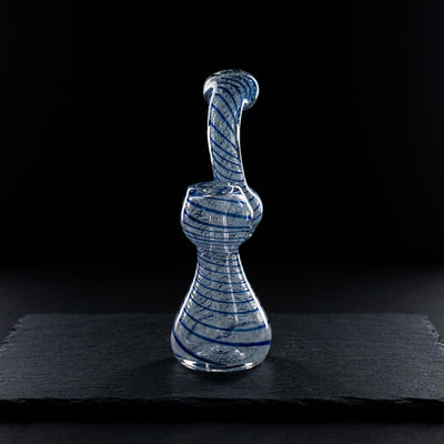 Editorial product photography on charcoal slate