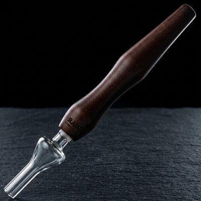Editorial product photography on charcoal slate