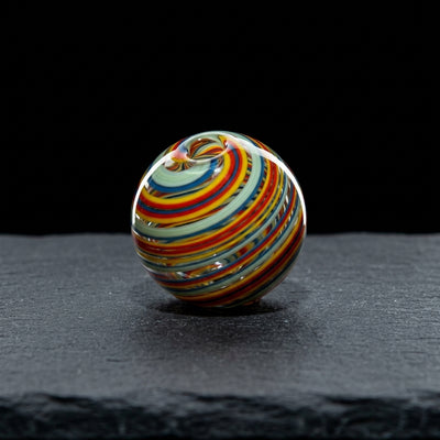 Editorial product photography on charcoal slate