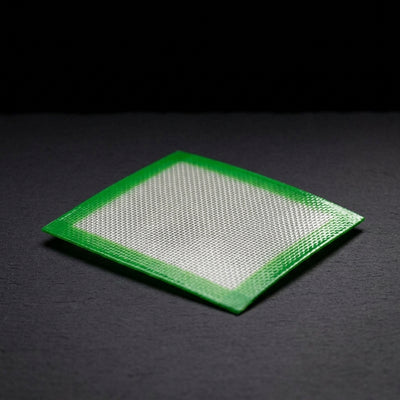Editorial product photography on charcoal slate