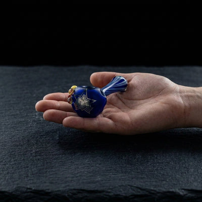 Editorial product photography on charcoal slate