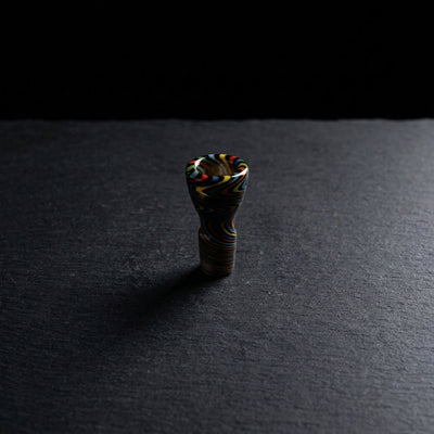 Editorial product photography on charcoal slate