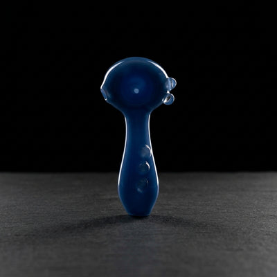Editorial product photography on charcoal slate