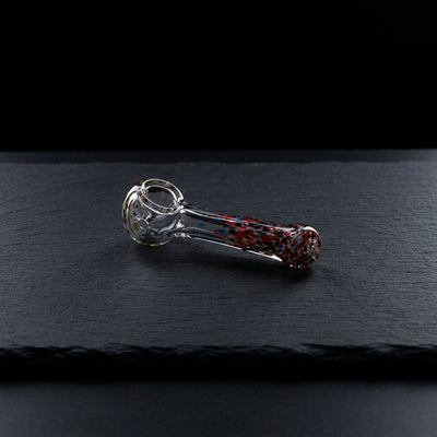Editorial product photography on charcoal slate
