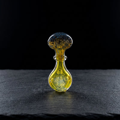 Editorial product photography on charcoal slate