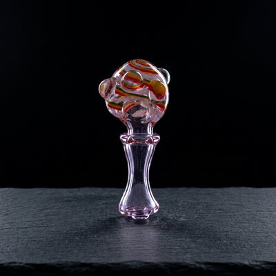 Editorial product photography on charcoal slate