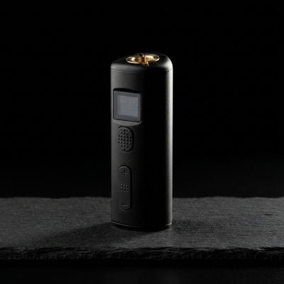 Editorial product photography on charcoal slate