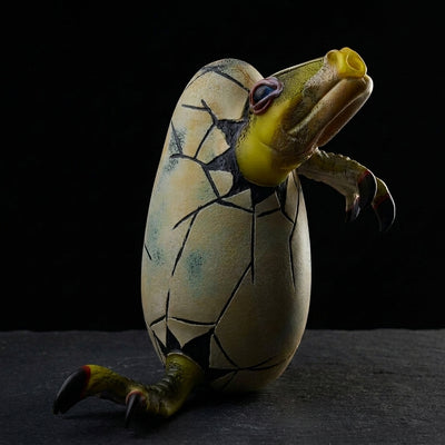 Kid Dino Hatchling Dino Egg - Yellow on dark slate surface - Oil Slick Pad