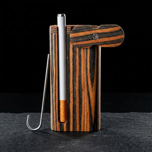 Editorial product photography on charcoal slate