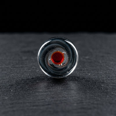 Editorial product photography on charcoal slate