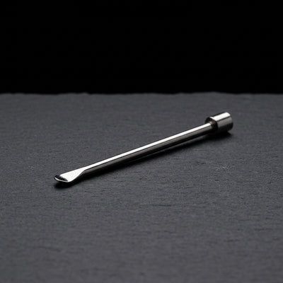 Editorial product photography on charcoal slate