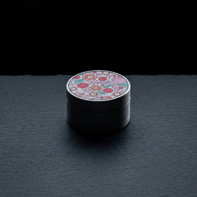 Editorial product photography on charcoal slate