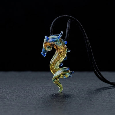 2" Peaselburg Dichro Dragon Pendant on dark slate surface - Oil Slick Pad