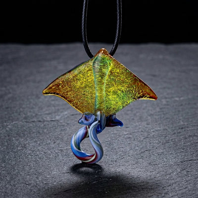 2" Peaselburg Dichro Stingray Pendant on dark slate surface - Oil Slick Pad