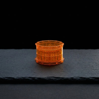 Editorial product photography on charcoal slate
