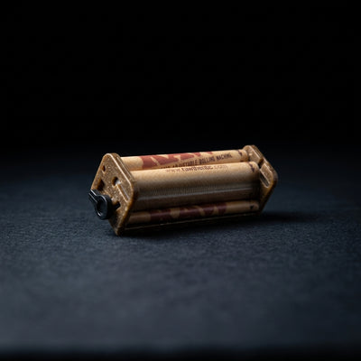 Editorial product photography on charcoal slate
