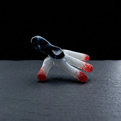 Editorial product photography on charcoal slate