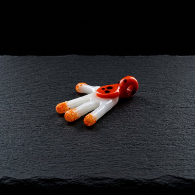 Editorial product photography on charcoal slate