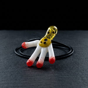 2.5" Rude Boy Chester Cheeto Dust Pendy - Yellow on dark slate surface - Oil Slick Pad