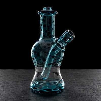 Editorial product photography on charcoal slate