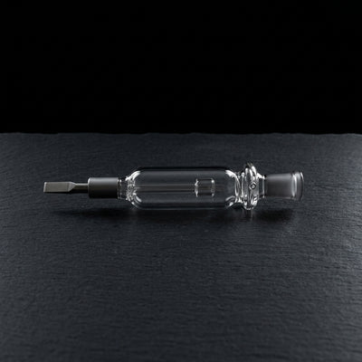 Editorial product photography on charcoal slate