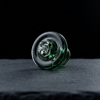 Editorial product photography on charcoal slate