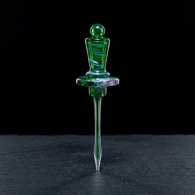 Editorial product photography on charcoal slate
