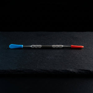 Editorial product photography on charcoal slate