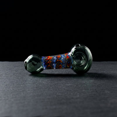 Editorial product photography on charcoal slate