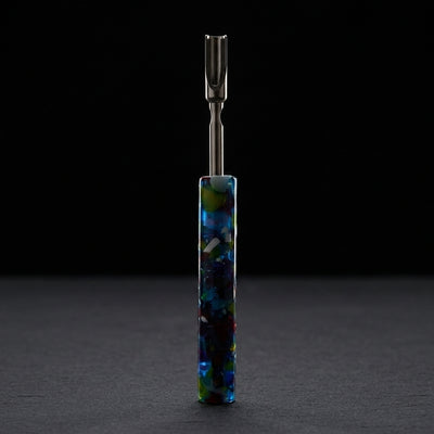 Editorial product photography on charcoal slate