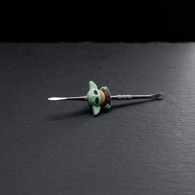 Editorial product photography on charcoal slate