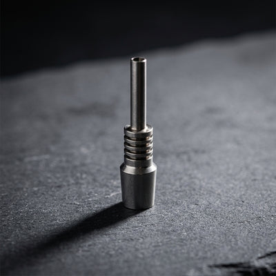 Editorial product photography on charcoal slate